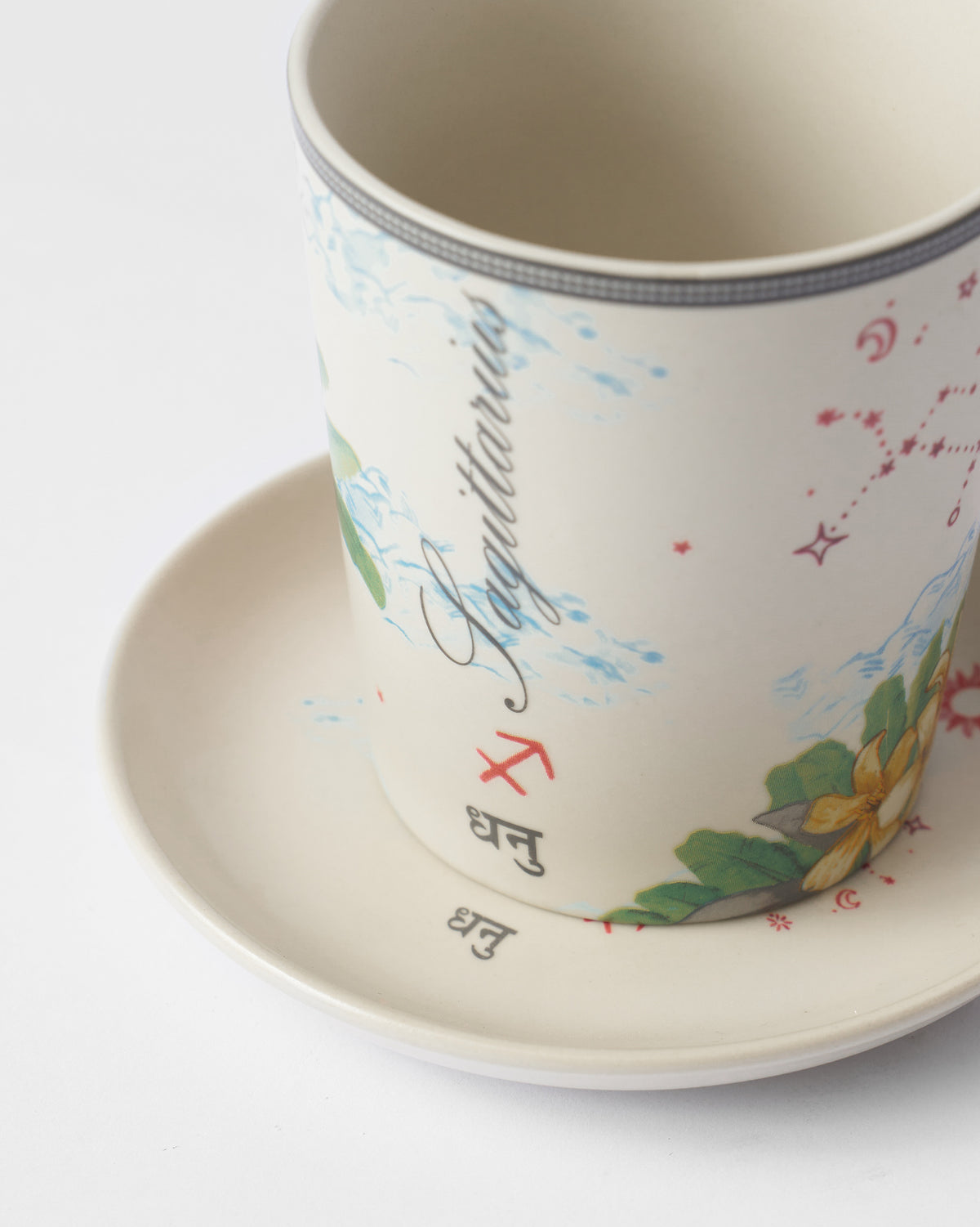 Close-up of Nico Sagittarius cup with Sagittarius, Dhanu, and constellation.
