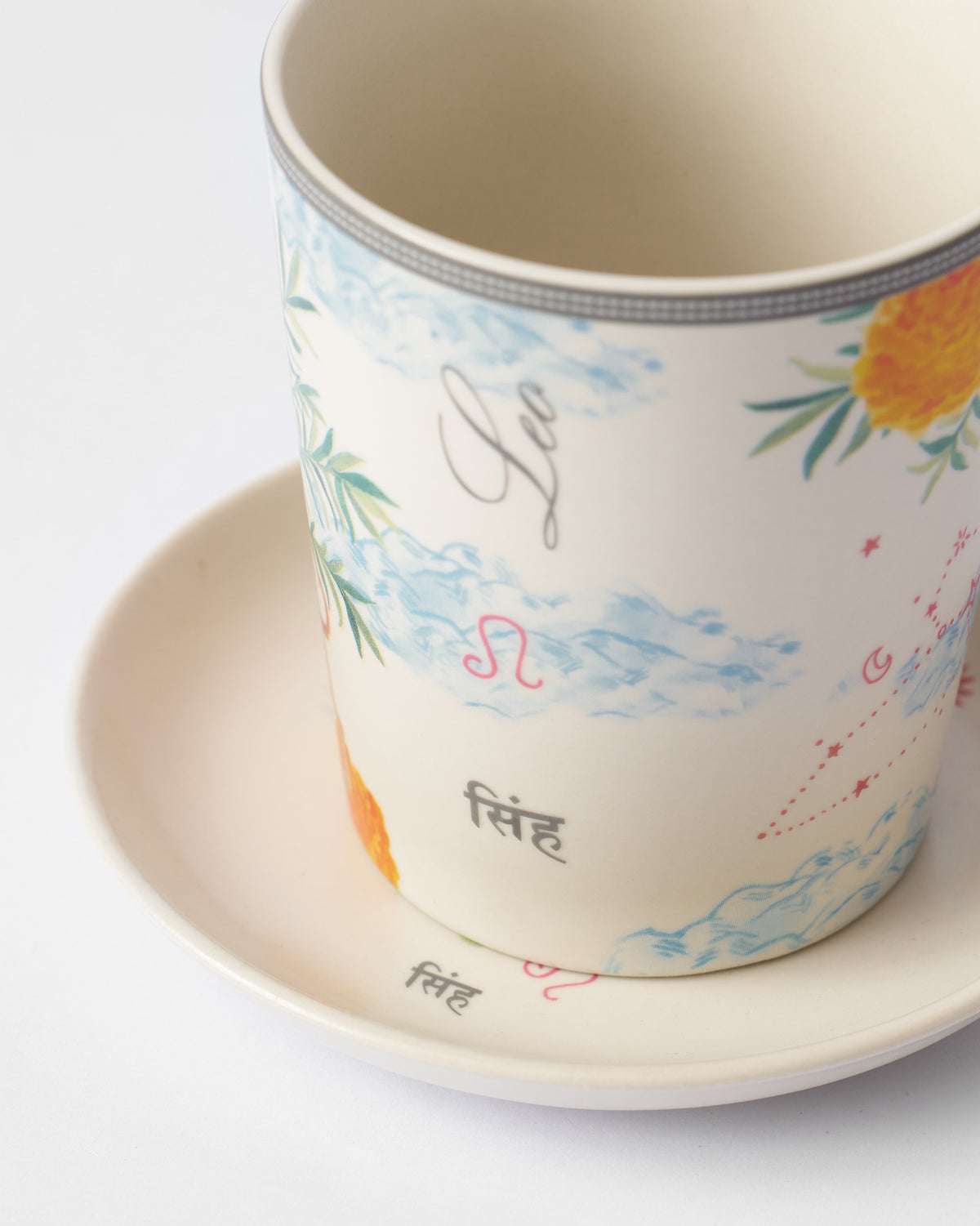 Close-up of the Nico Leo mug with Leo and सिंह lettering.
