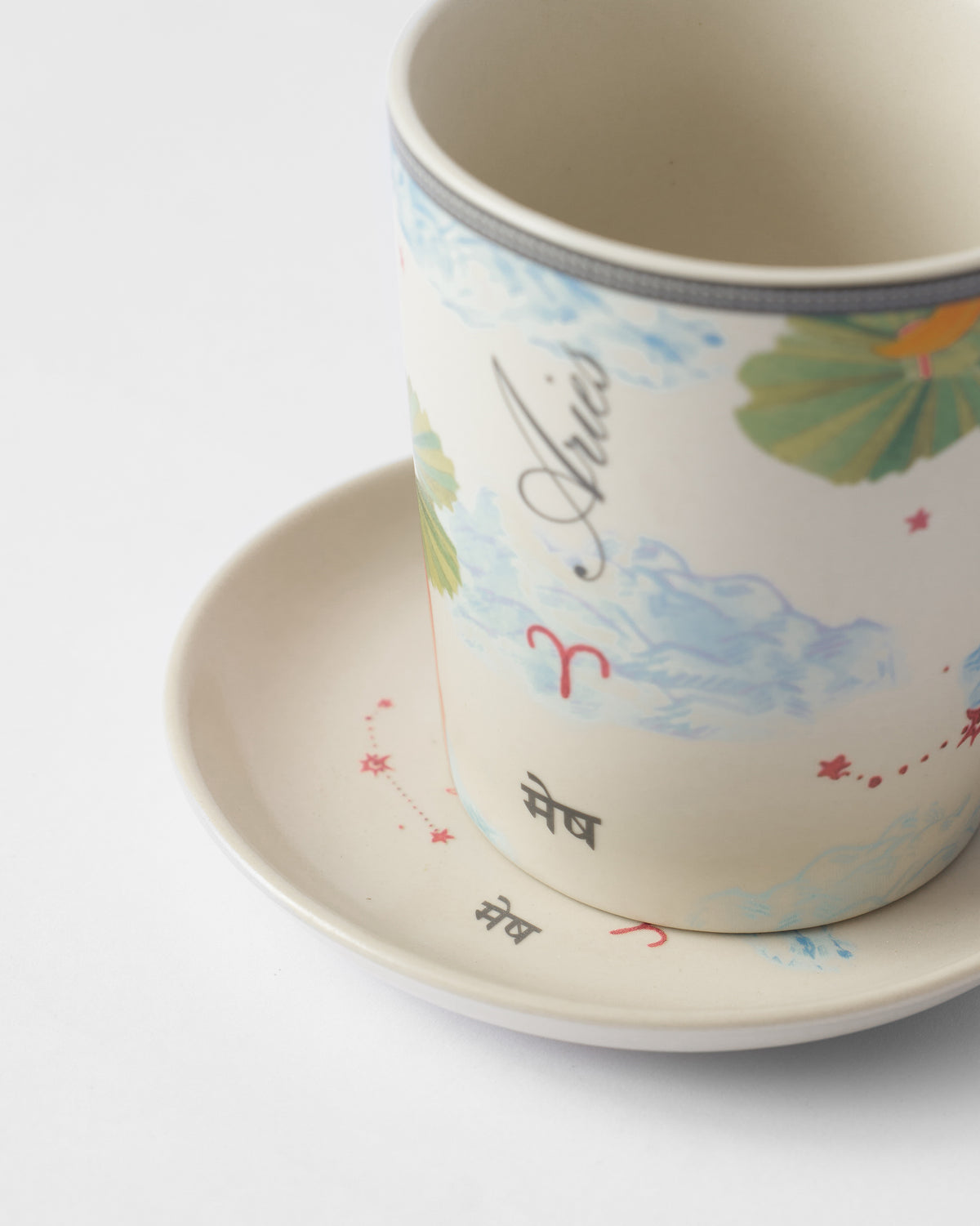 Close-up of the Nico Aries mug with Aries and मेष lettering.