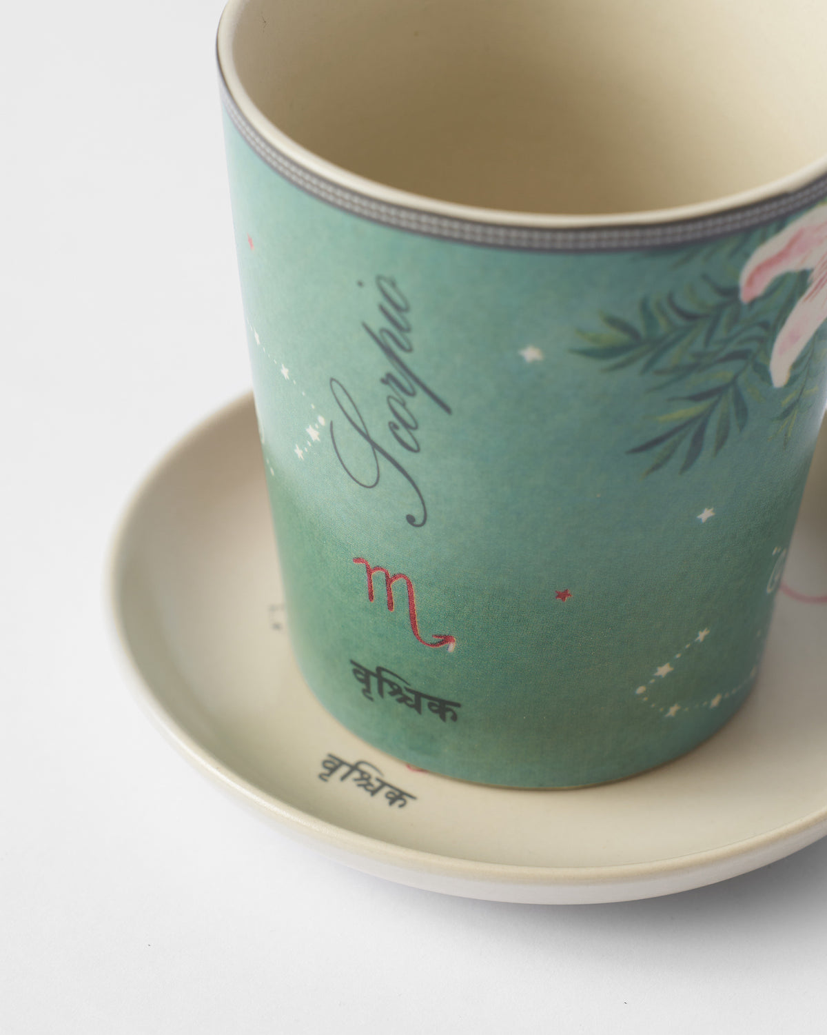 Close-up of the Nico Scorpio mug with Scorpio and वृश्चिक lettering.