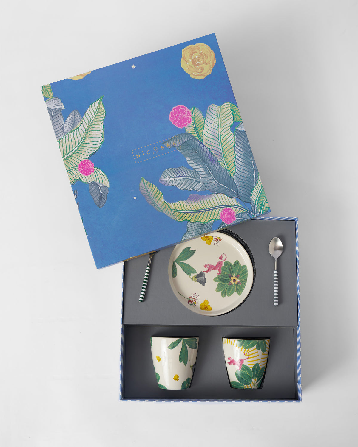 Waadi gift set packed in an open blue tropical Nicobar box.