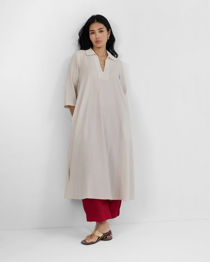 Ivory-and-beige striped Maner seersucker kurta with an A-line fit and deep V neckline.