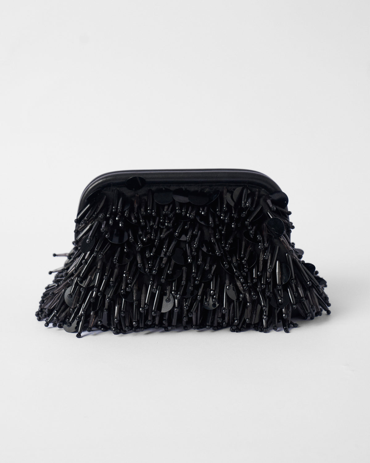 Black Starry Night Clutch with dense beaded fringe and a curved frame.