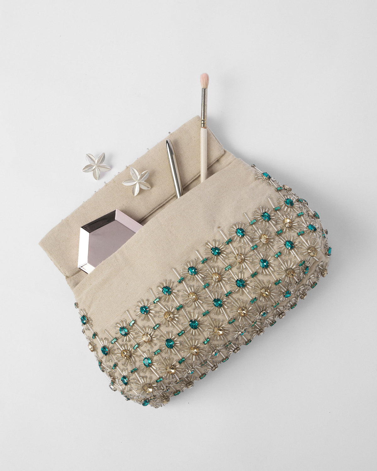 Ivory Noor Clutch packed with evening essentials.