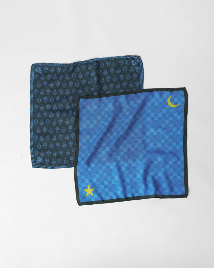 Pair of blue Twilight Pocket Squares with check, moon, star, and buta prints.
