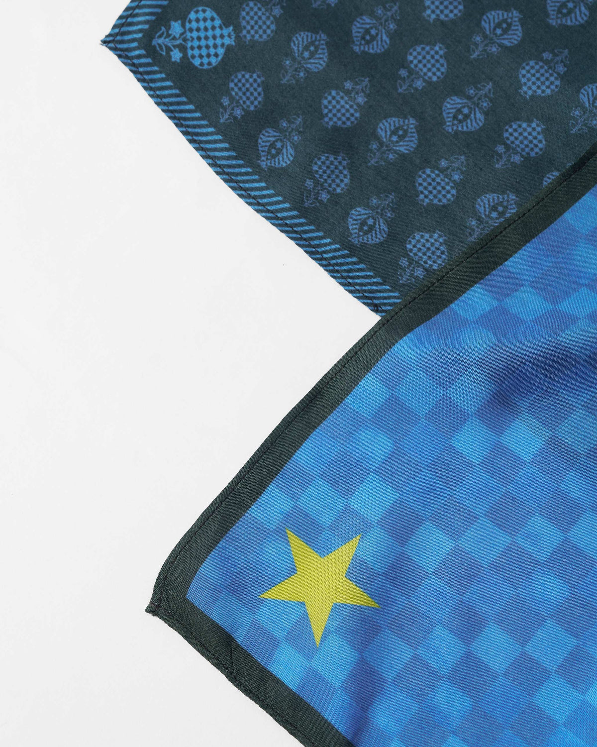 Close-up of Twilight Pocket Square corners with a yellow star and buta border.