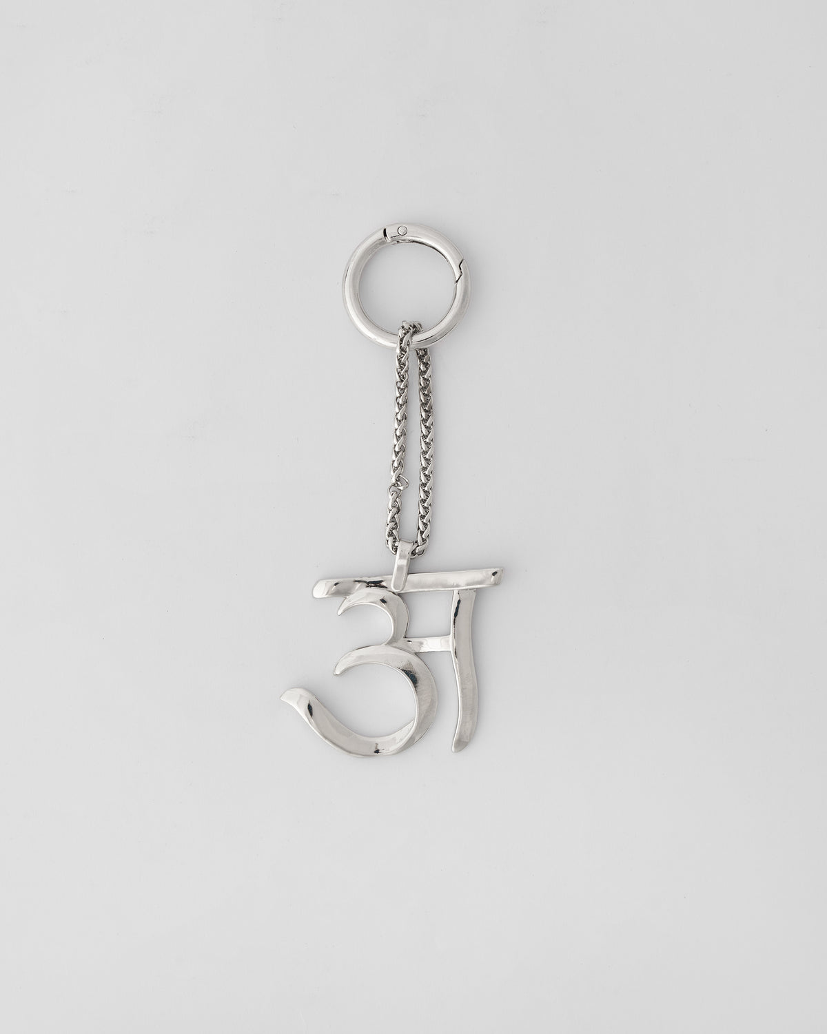 Alphabet A Bag Charm in silver hanging upright from its clasp ring.