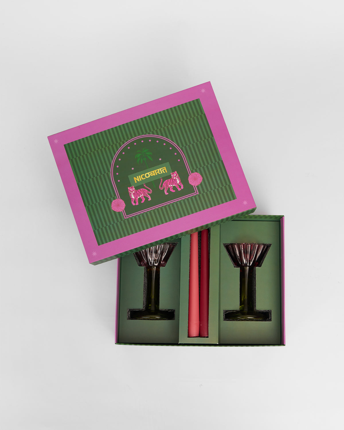 Ember gift box with its lid tilted aside, revealing the holders and candles.