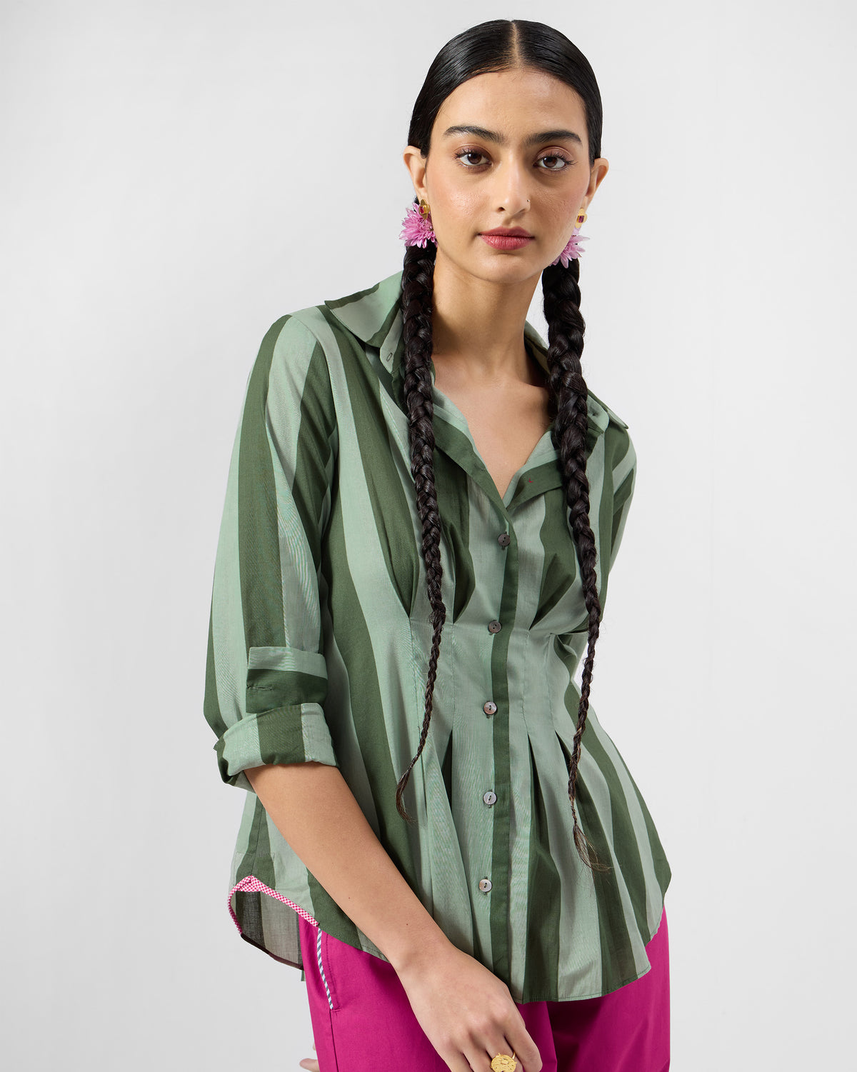 Olive striped Amalis shirt with pink piping along the hem.