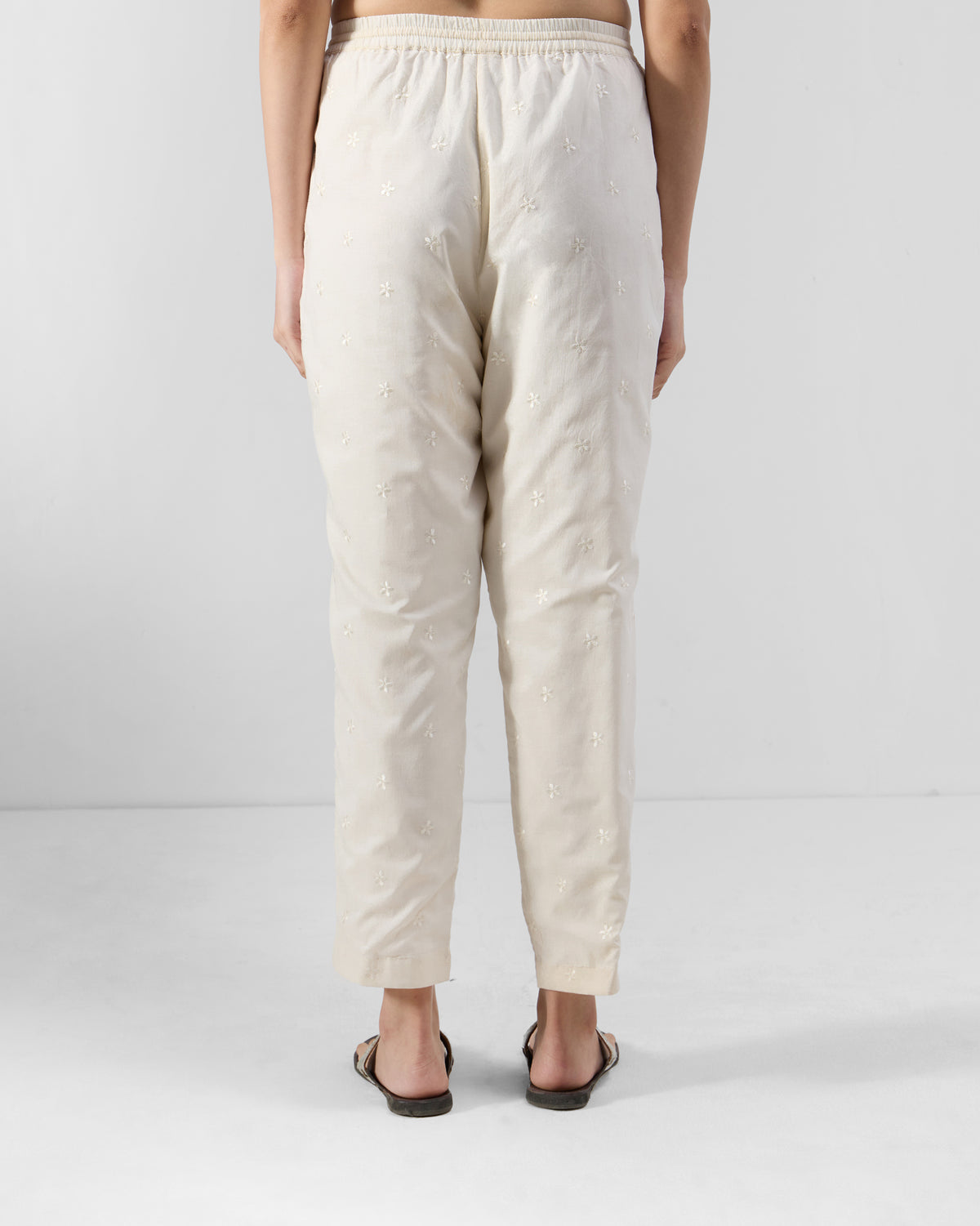 Back of ivory embroidered Kintara Pants with a gathered elastic waist.