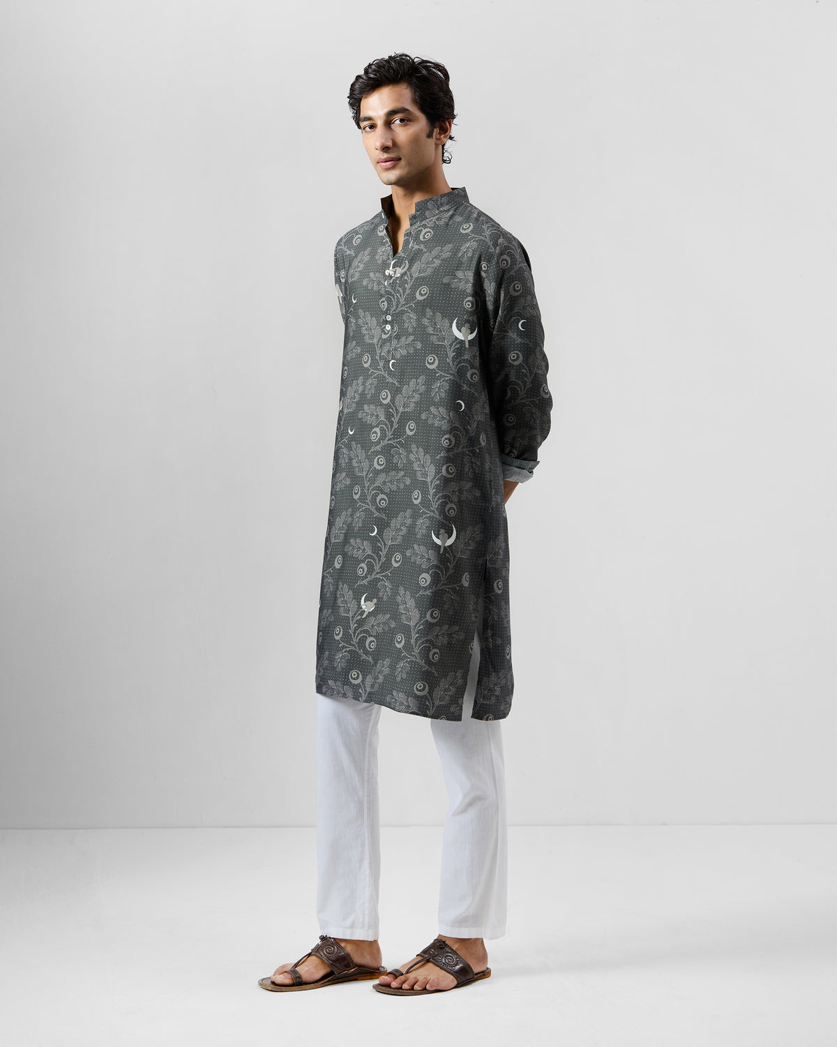 Side view of a charcoal Rey Kurta with moon and botanical print.