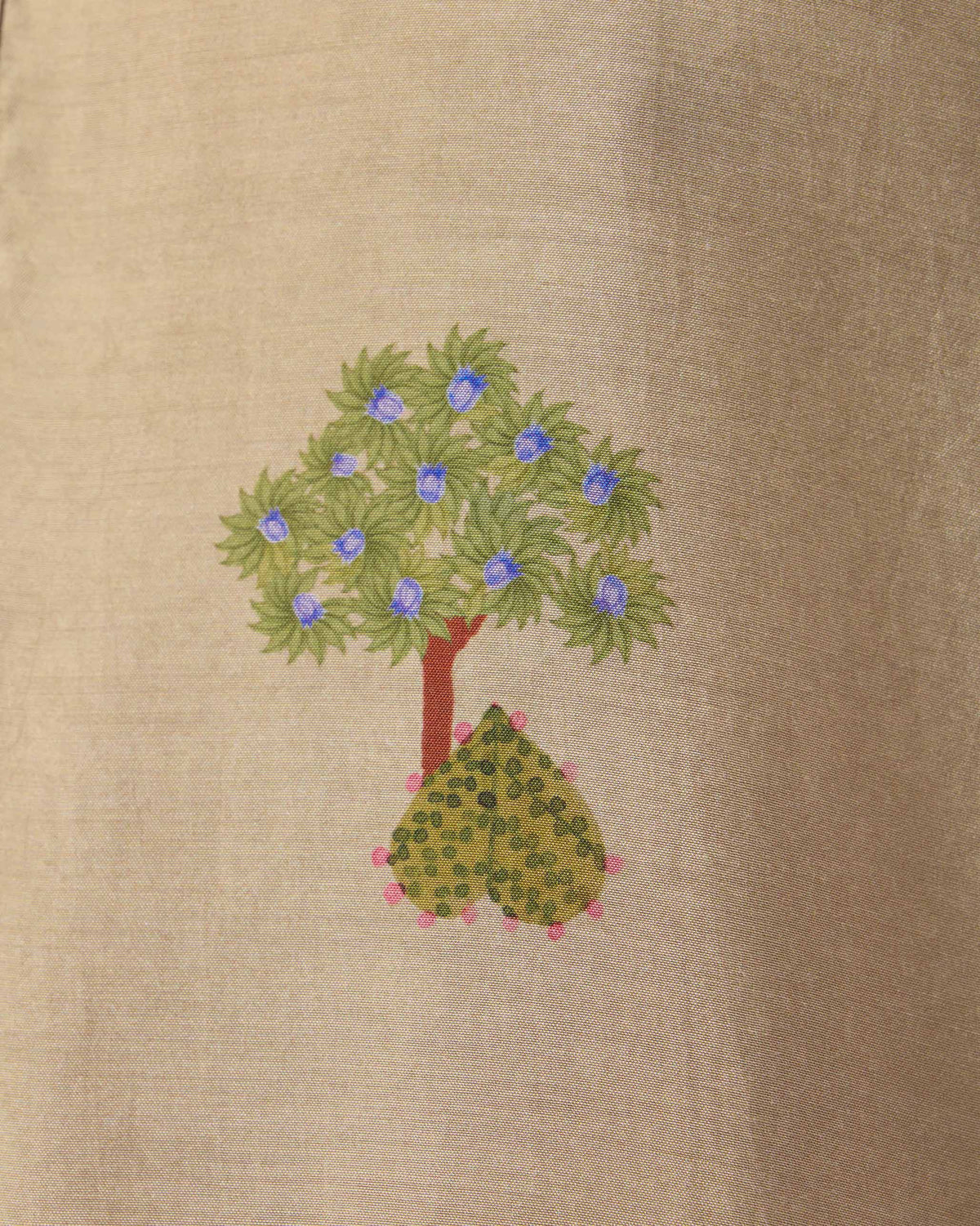 Close-up of a tree motif on a beige Bageecha kurta.