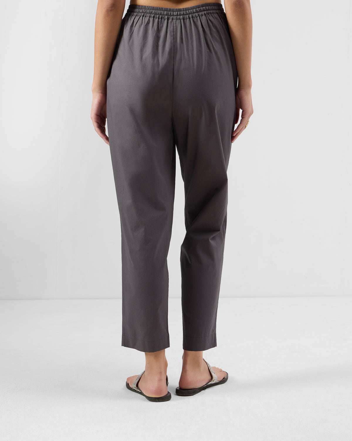 Back of charcoal Narrow Pants with a cropped tapered leg.