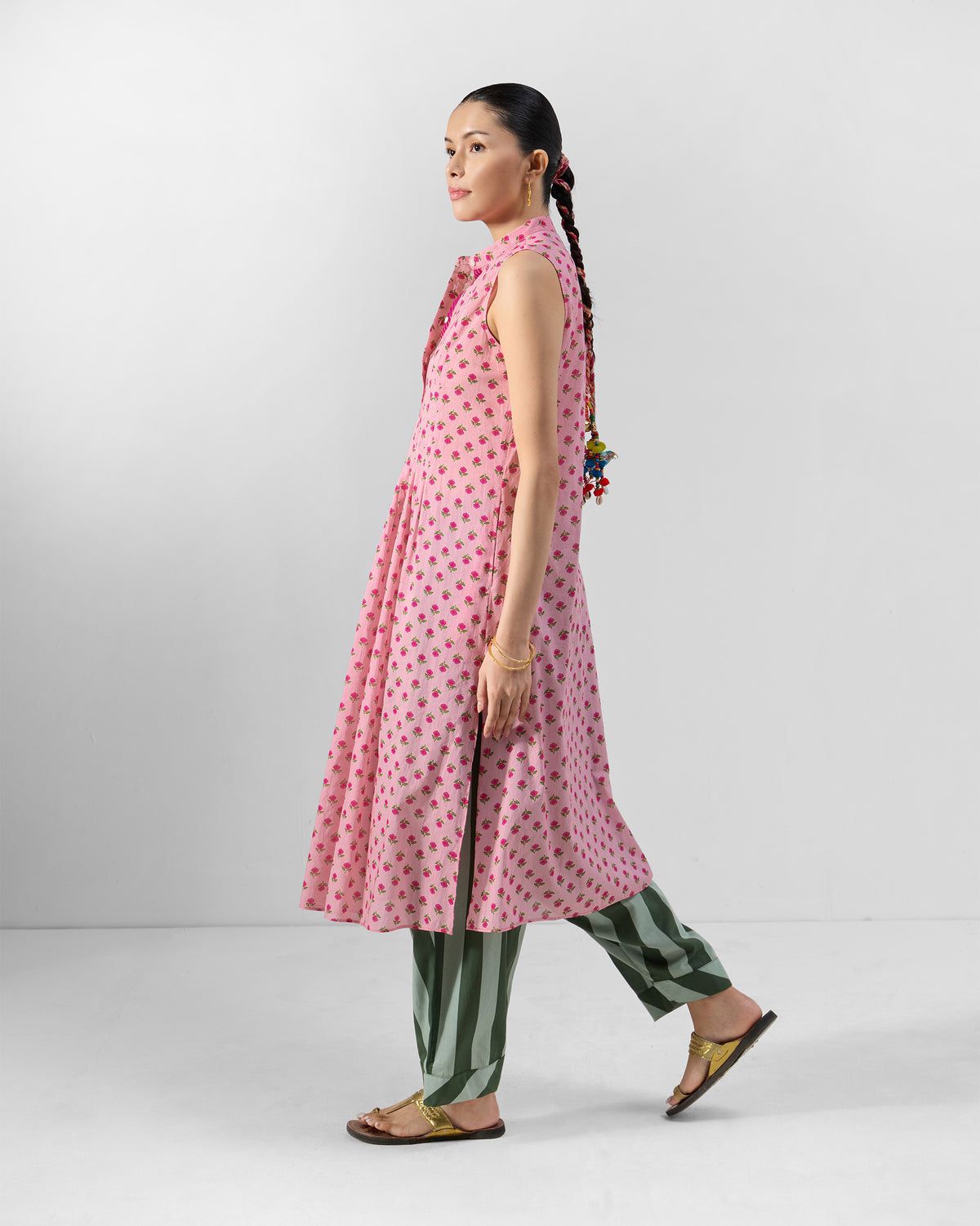 Side view of a pink floral Summer Fun kurta with side slits.