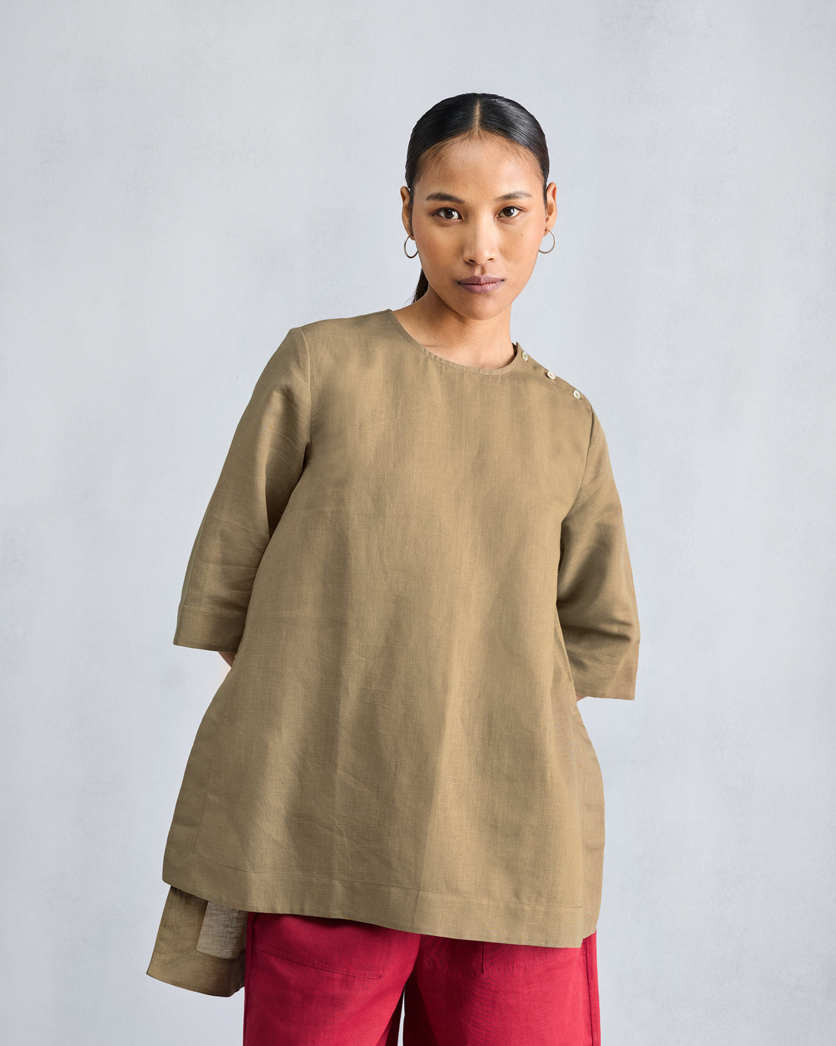 Taupe High Slit Top with wide elbow sleeves and shoulder buttons.