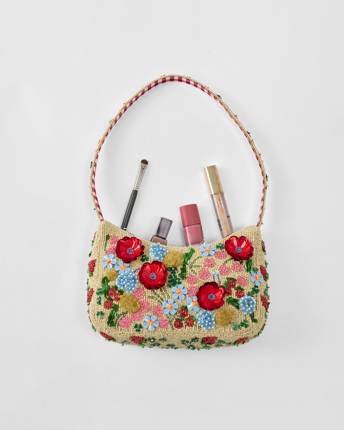 Floral embroidered Bloom Bag open showing beaded flowers.