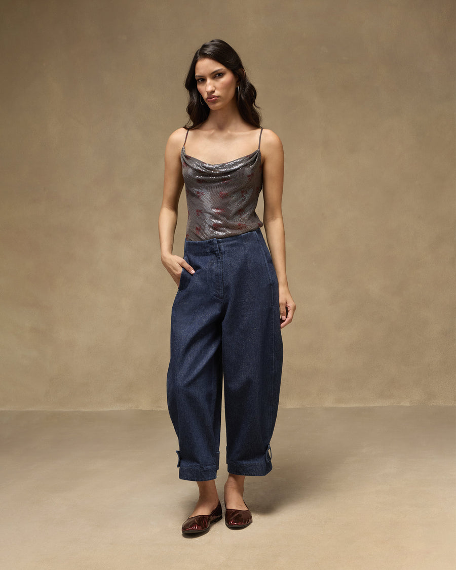 The Groove Pants worn with a sequinned top and flats.