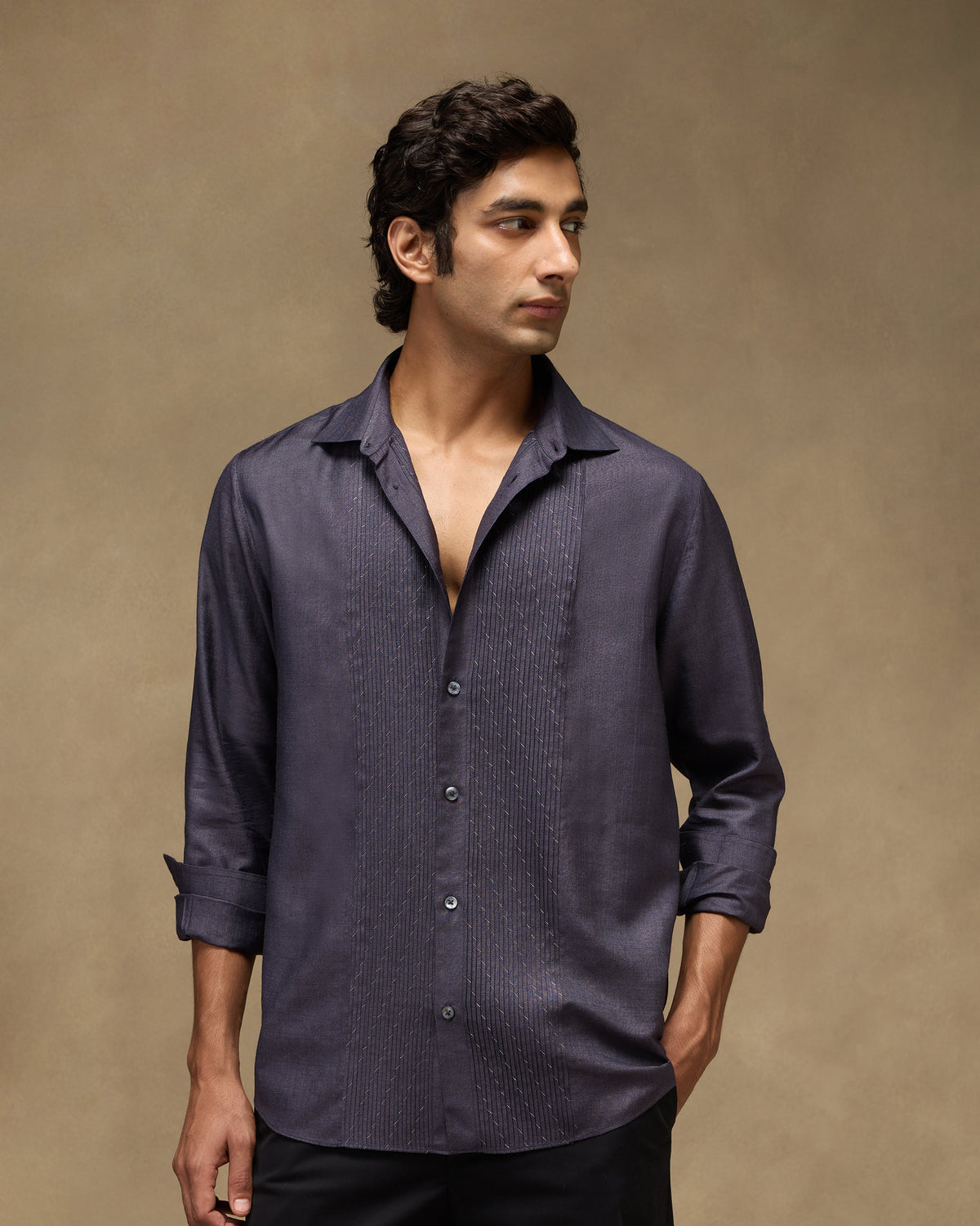 Person wearing a light purple Afterglow shirt with a pintuck front bib.