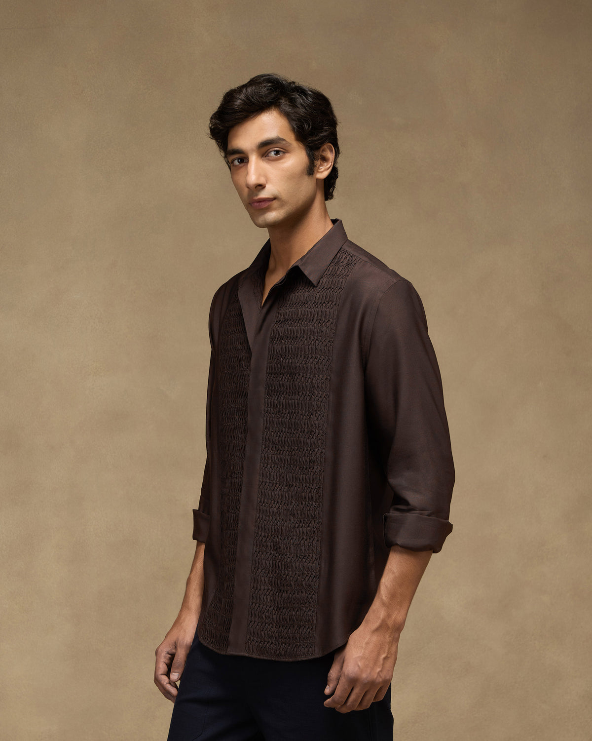 Side view of a deep brown Afterhours shirt with textured pintuck panels.