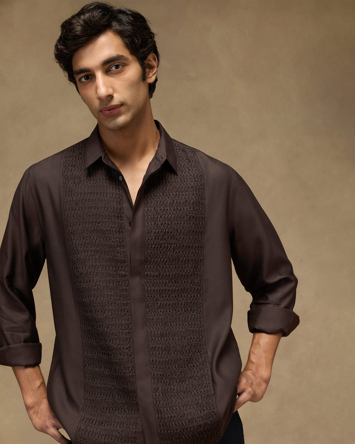 Deep brown Afterhours shirt showing dense tonal pintuck panels at the front.
