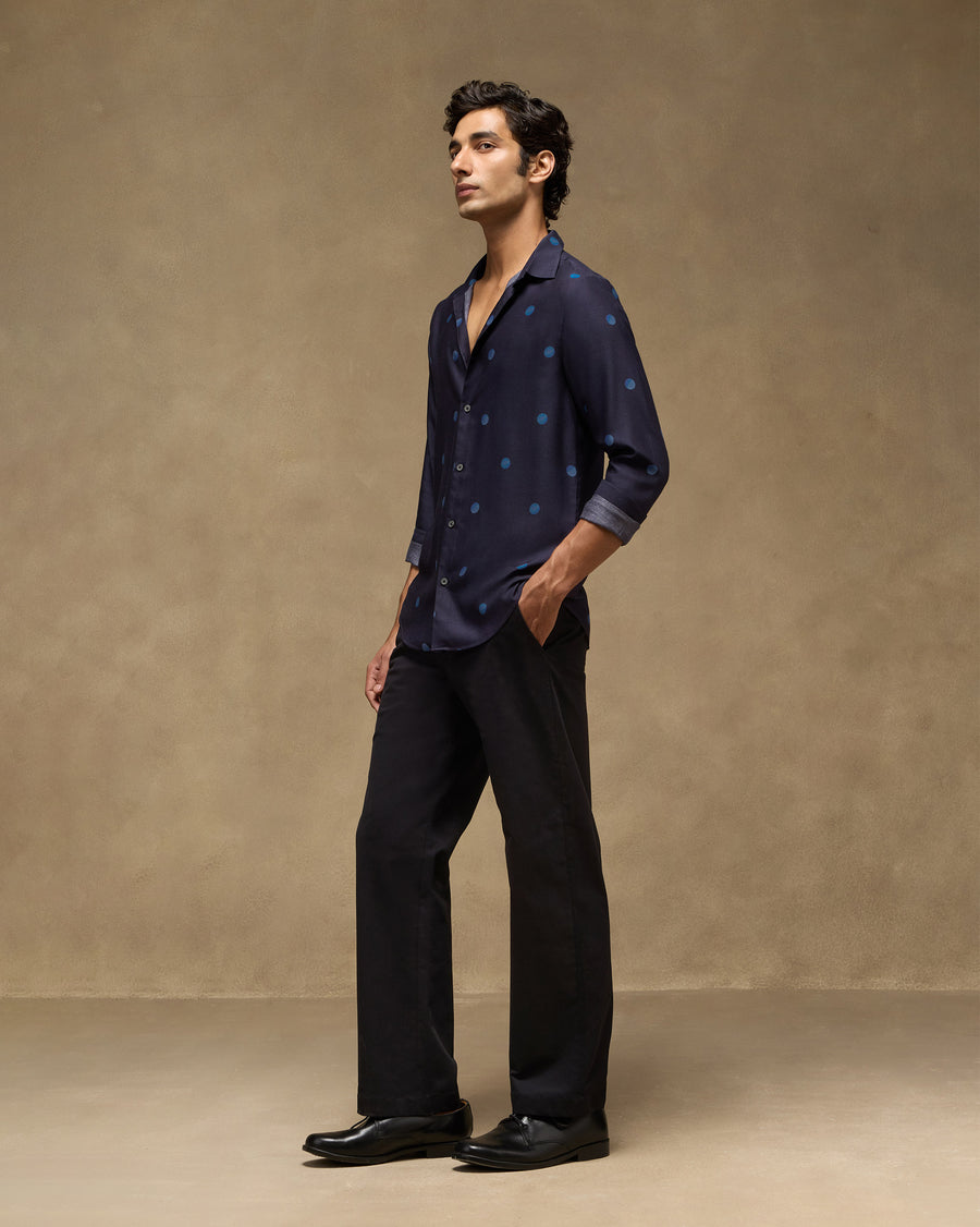 The Daze Shirt tucked into the black Panther Trousers, sleeves rolled.