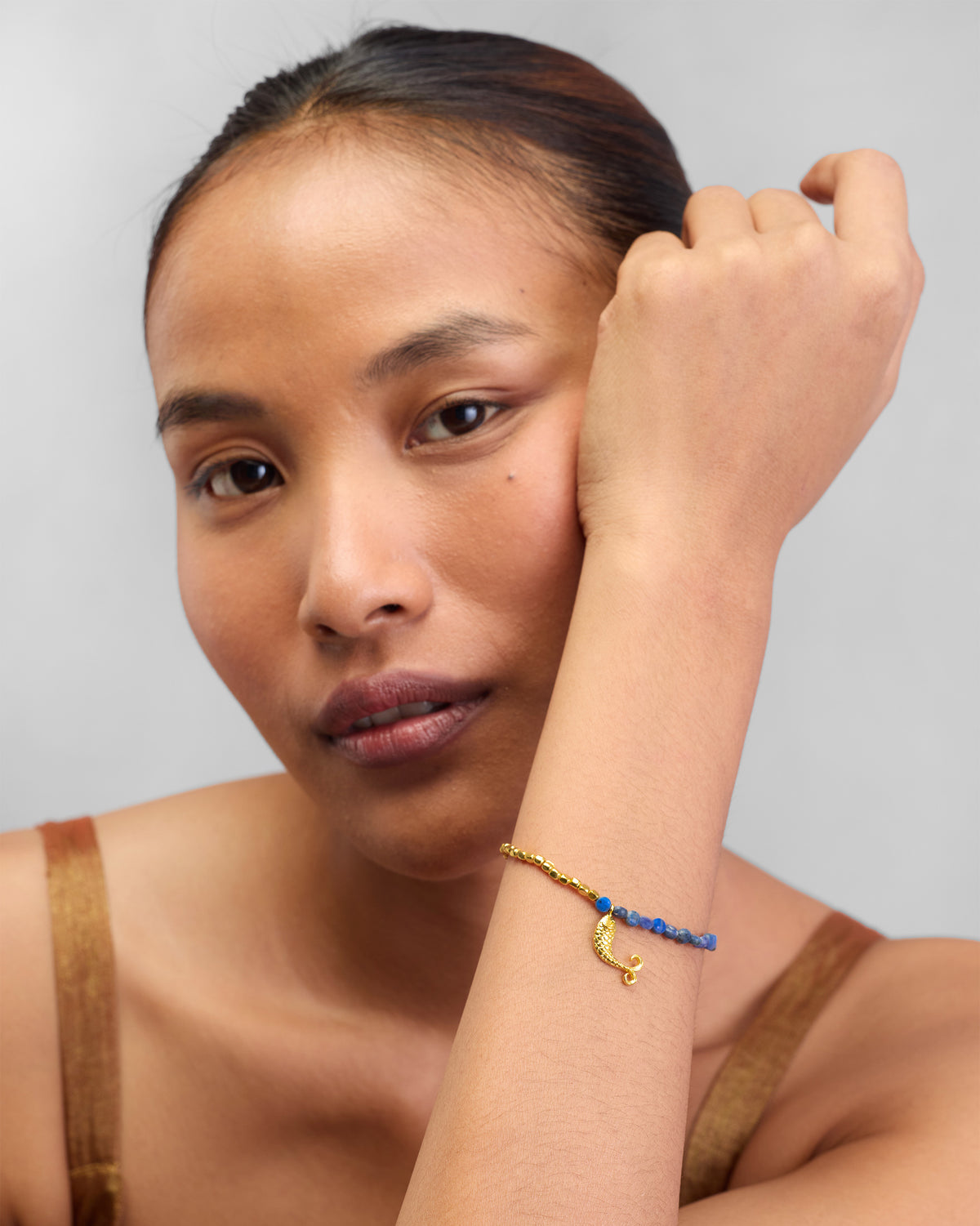 Person wearing a Jalpari Bracelet on the wrist.