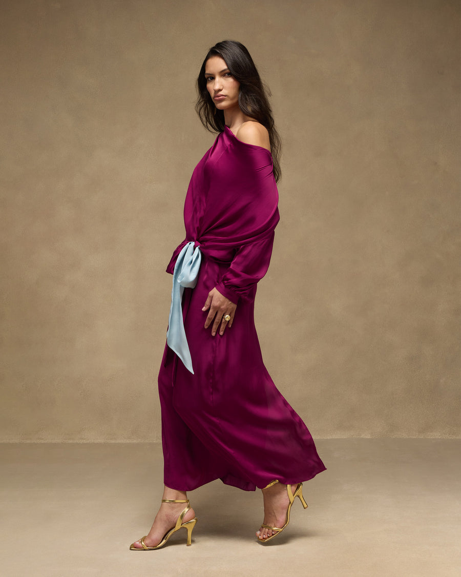 The Fireside Dress mid-stride, the skirt swinging and the ice-blue tie trailing.