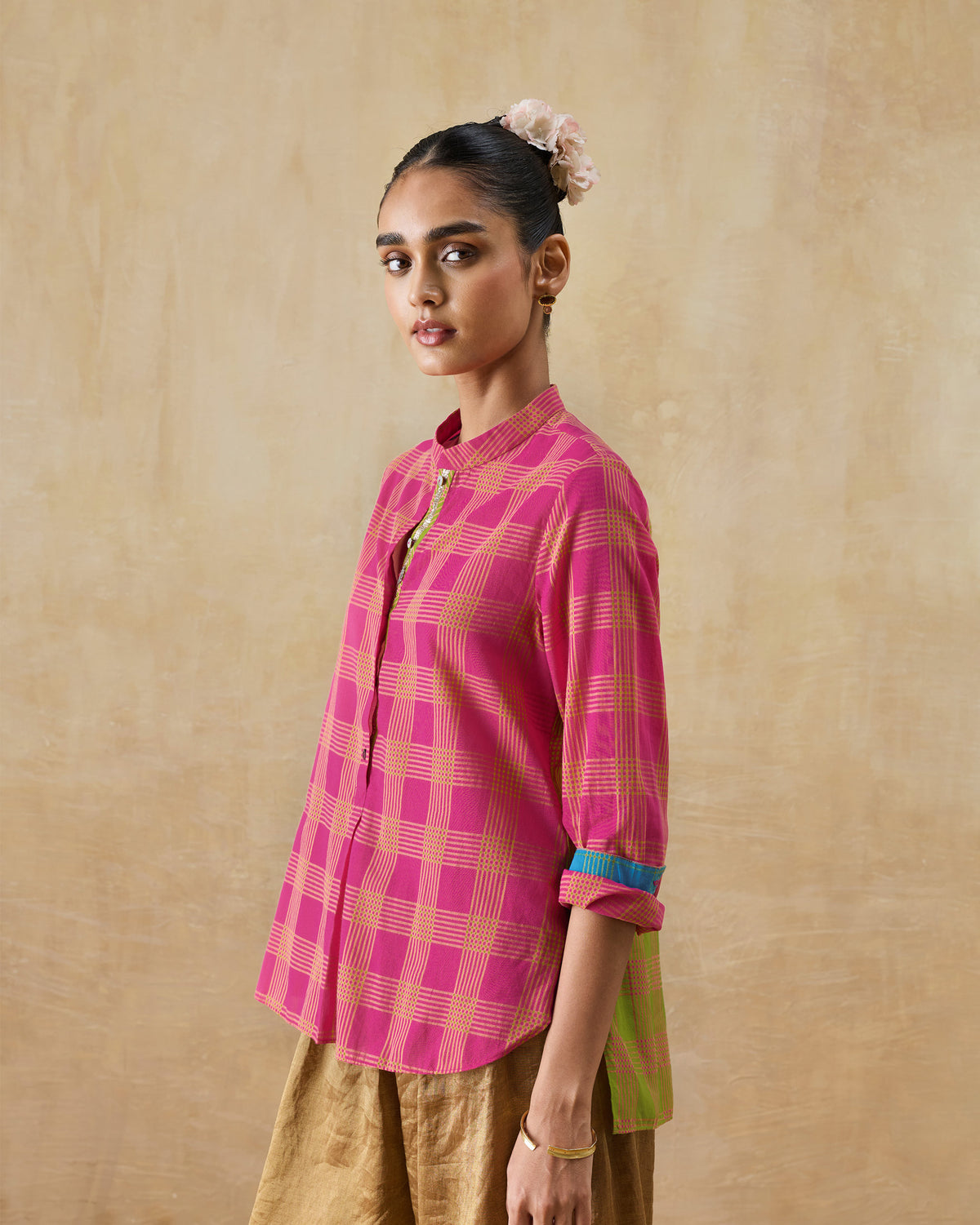 Berry and lime mandarin collar top with a yellow grid print worn at an angle.