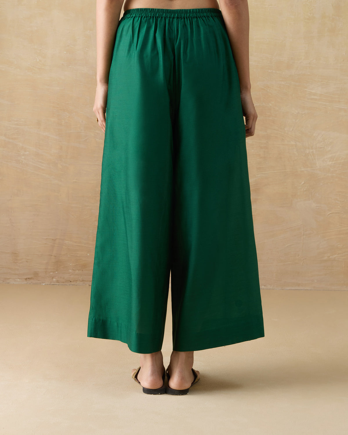 Back of emerald green Basic pyjamas with an elastic waist.