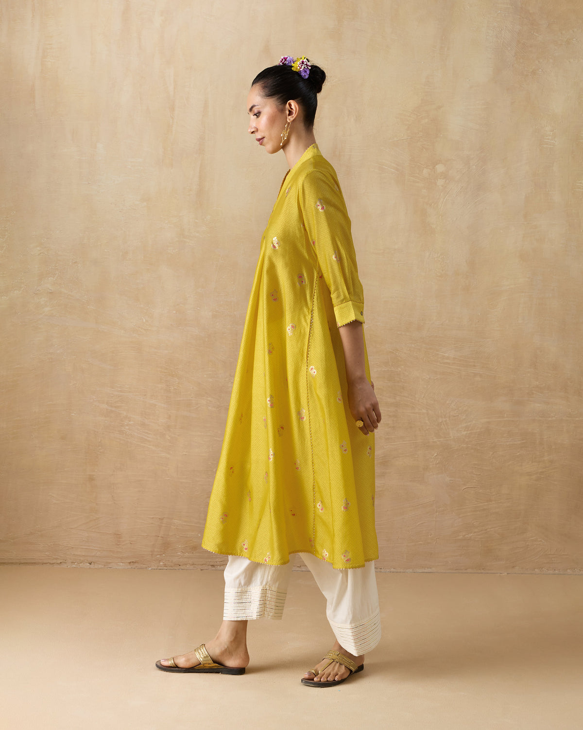 Side view of a chartreuse Viva kurta with floral print and three-quarter sleeves.
