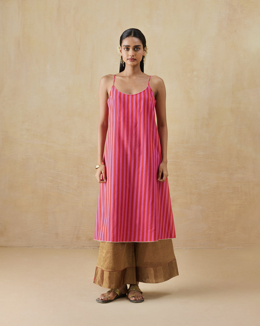The Mist Camisole worn over gold Charisma Pants.