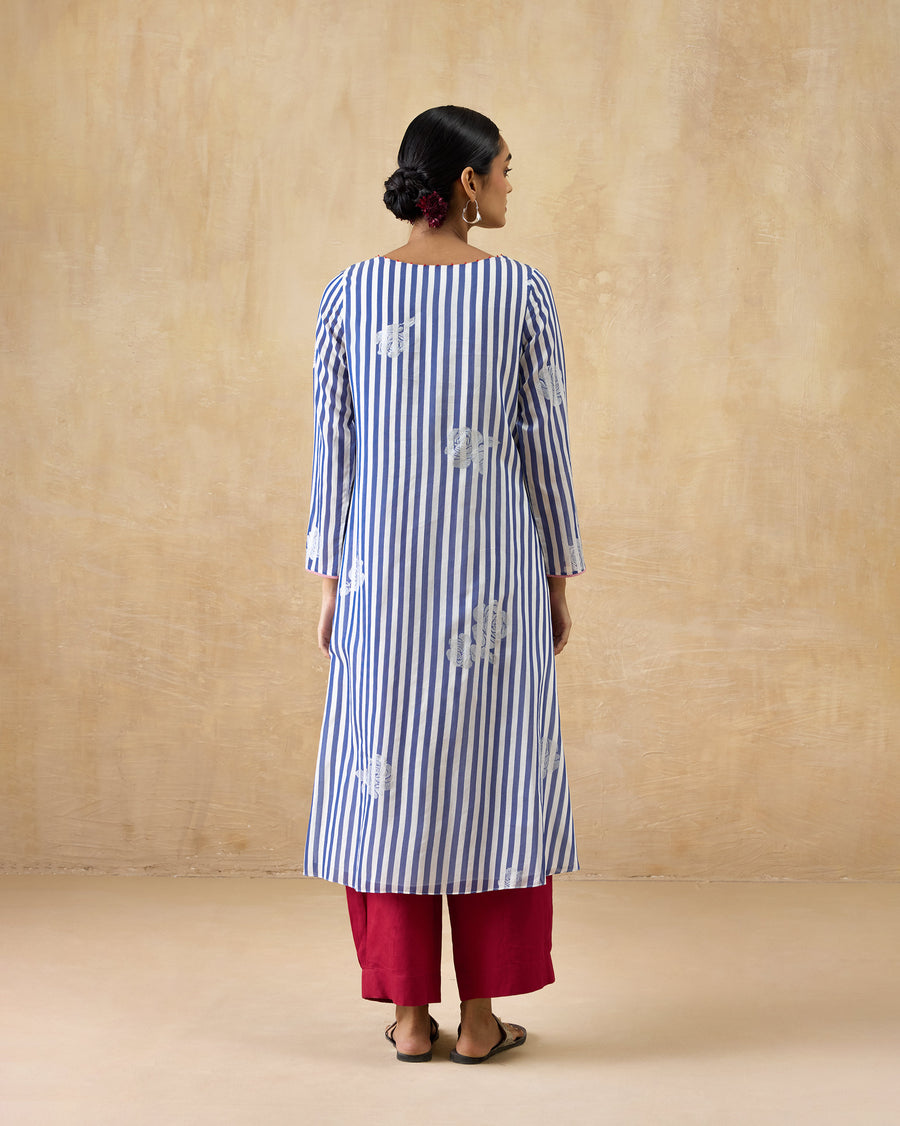 Back view of the Boat Neck Kurta worn over red Serene Pants.