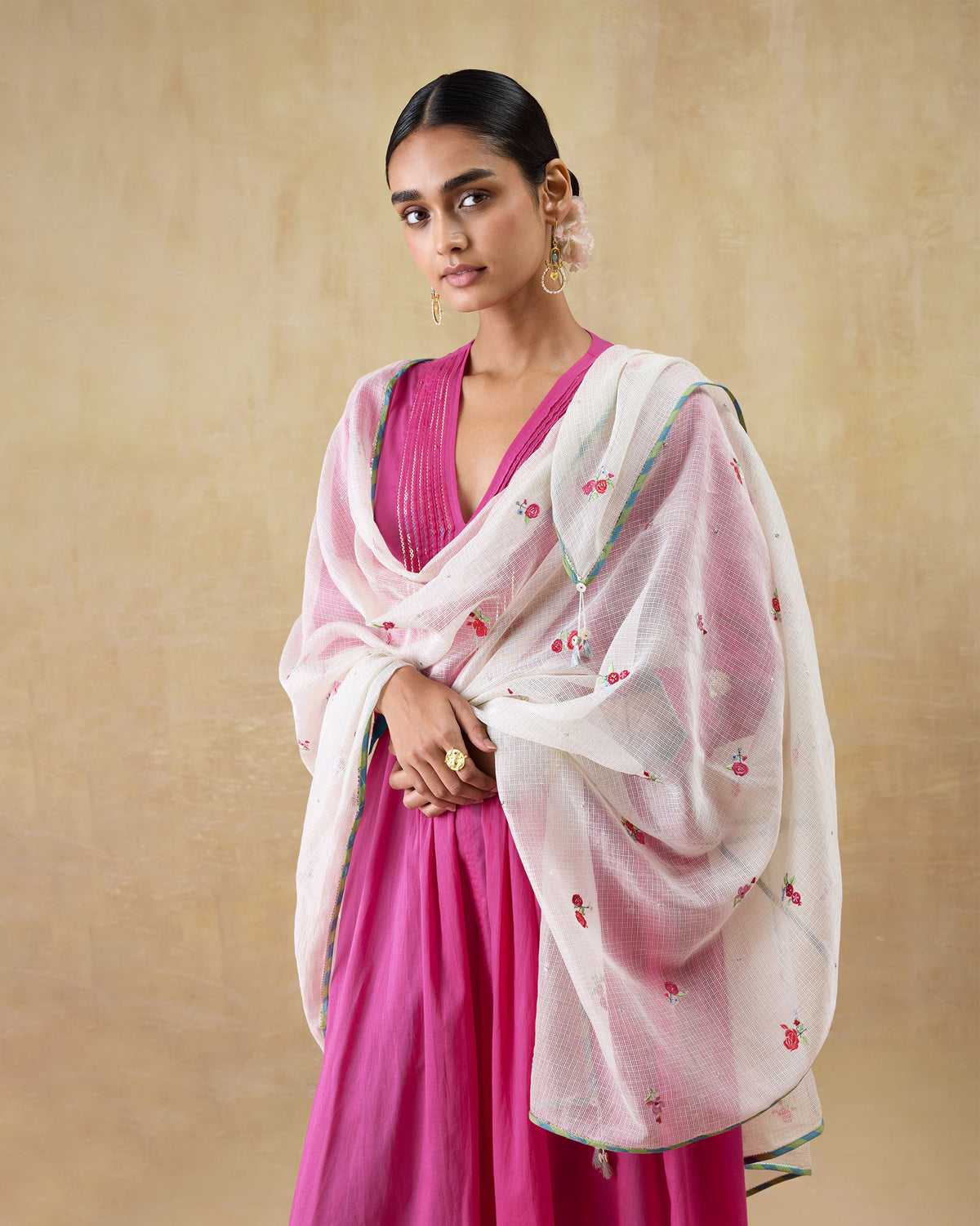 Person wearing a Swish dupatta draped over the shoulders.