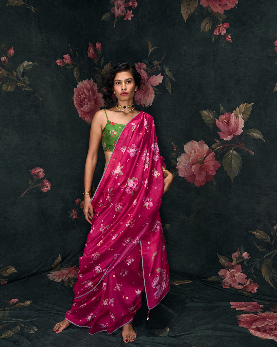 The Speckle Sari draped loose with a bright blouse against a dark floral backdrop.