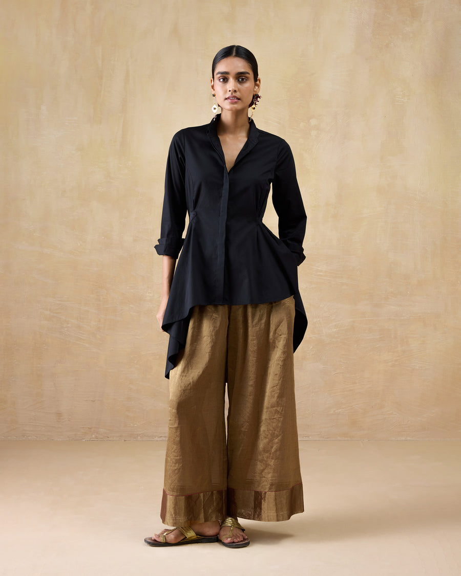 The Rai Top worn over gold Charisma Pants.