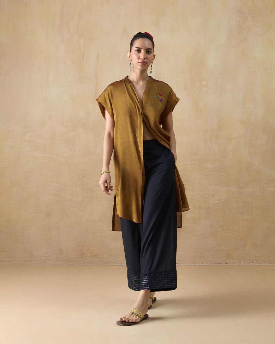The Stellar Pants worn with the gold Tango Kaftan open over them.
