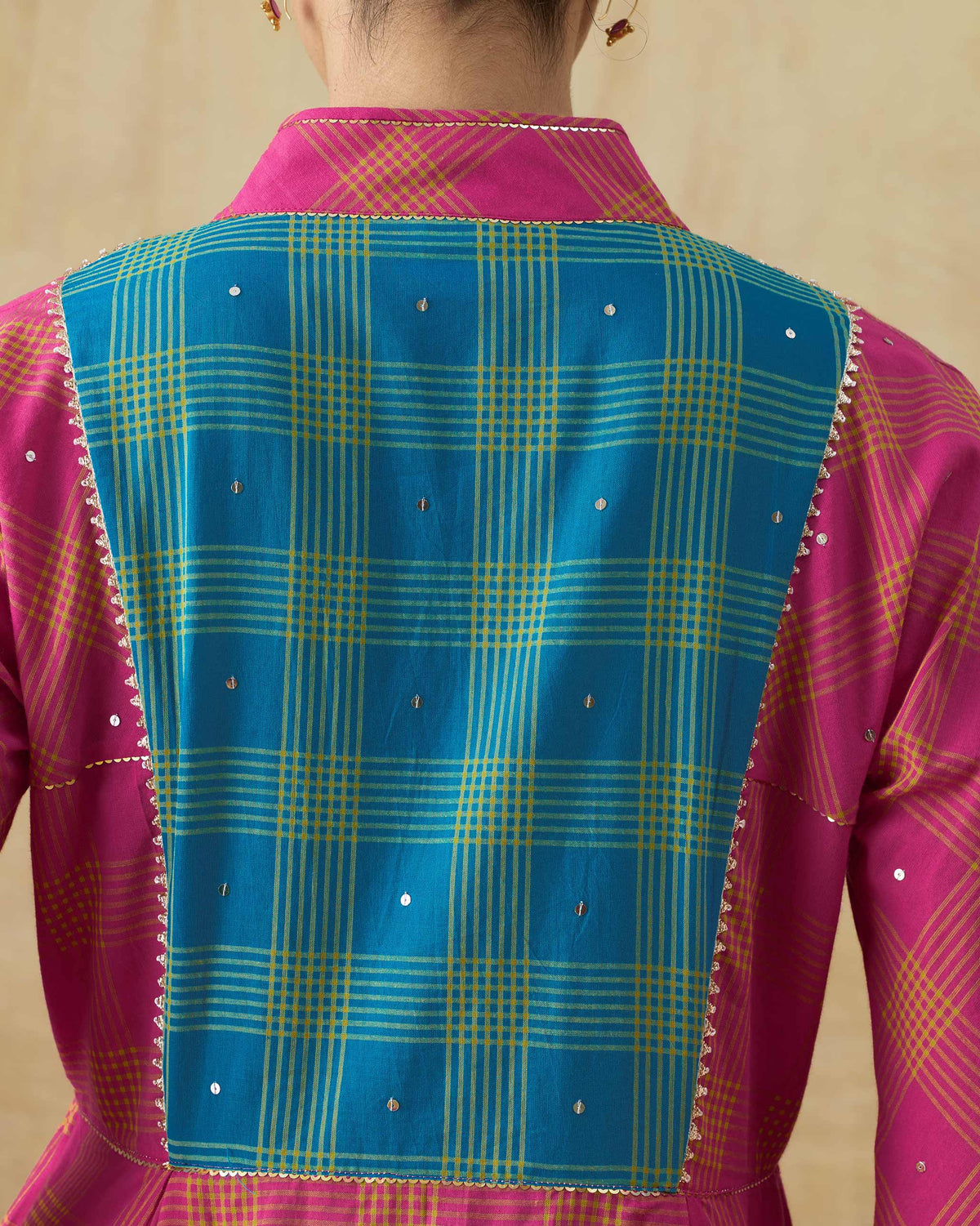 Close-up of the teal check back panel with sequins on the Drifter kurta.