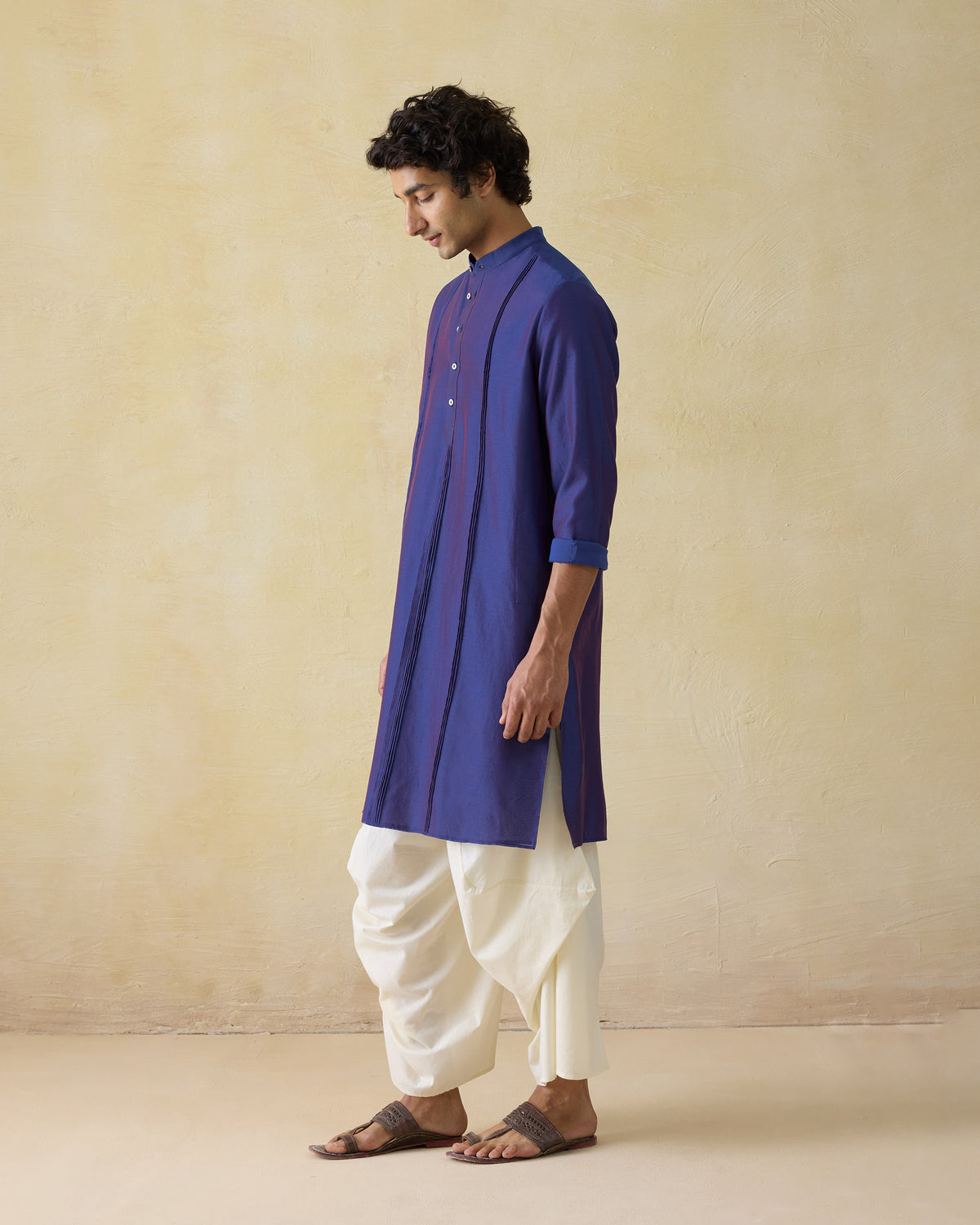Side view of a dual-tone purple Naaz kurta with front pintucks.