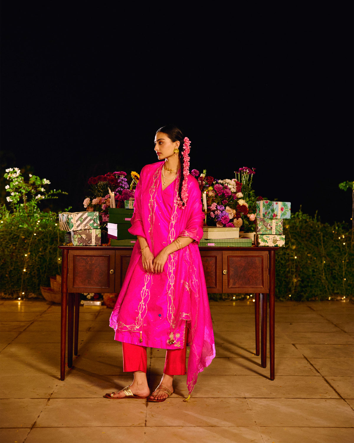 Full-length view of a person wearing a magenta Milni kurta with a pink dupatta.