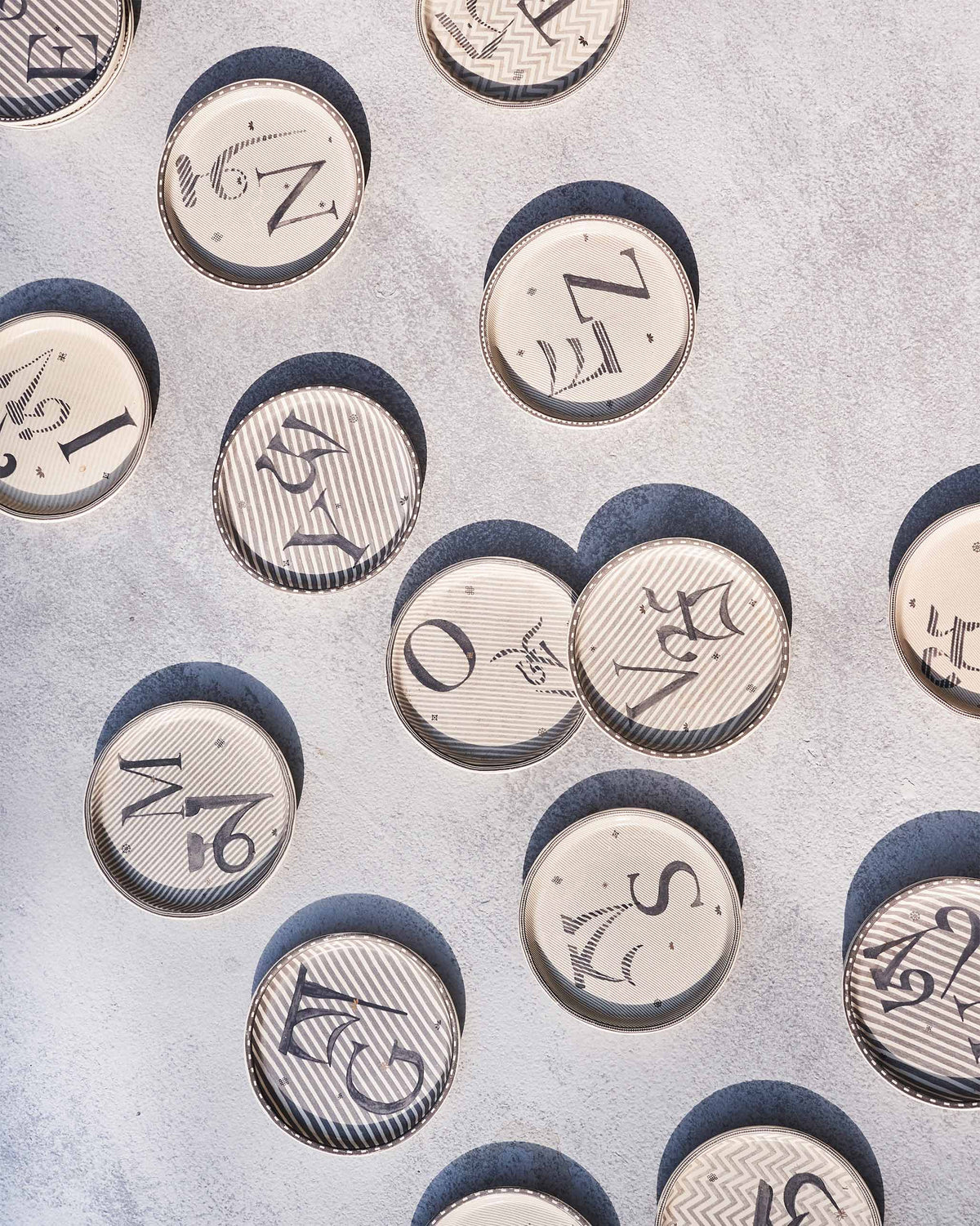 Coasters with assorted letters.