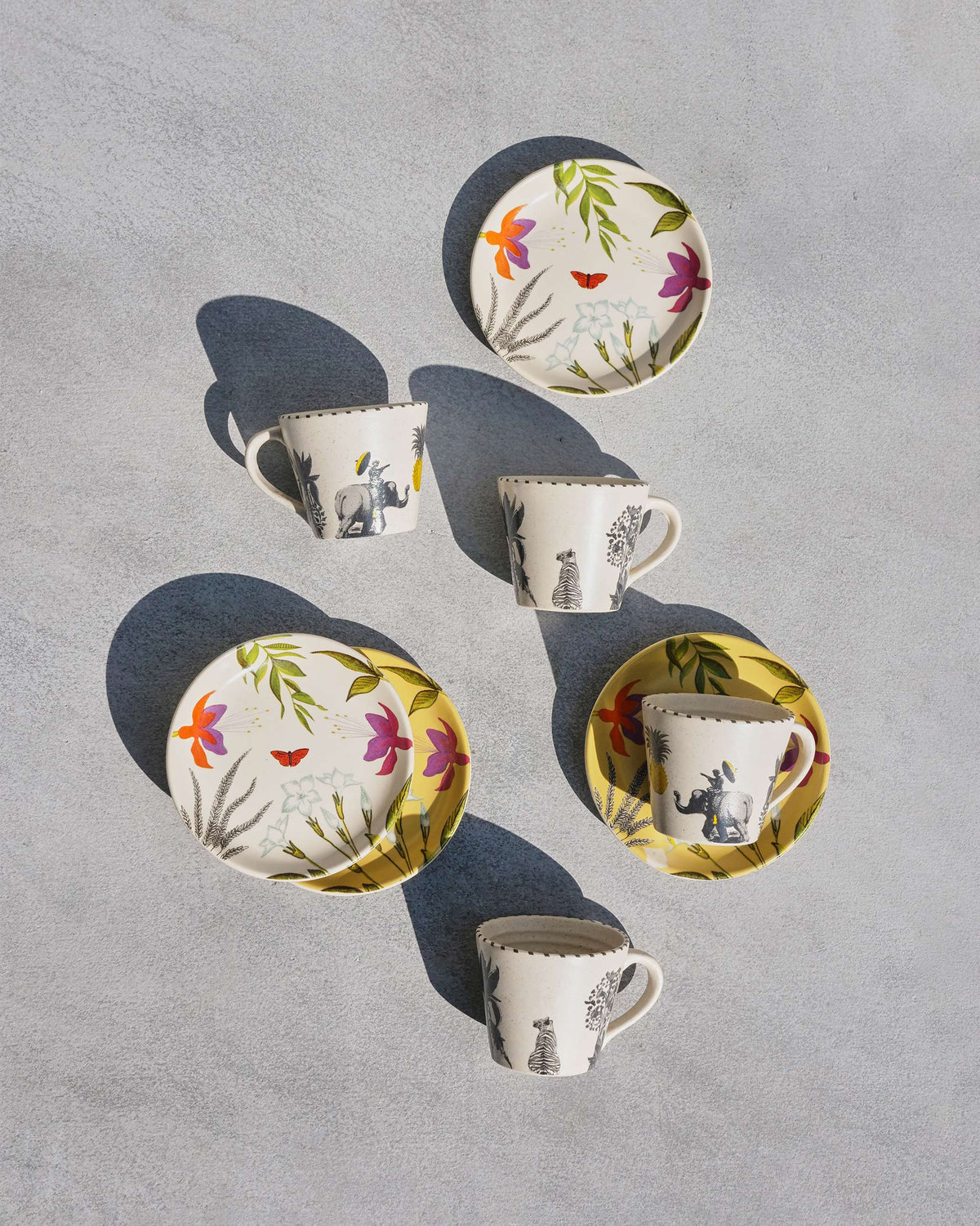 Botanical Brew Set with animal espresso mugs and floral tea plates.