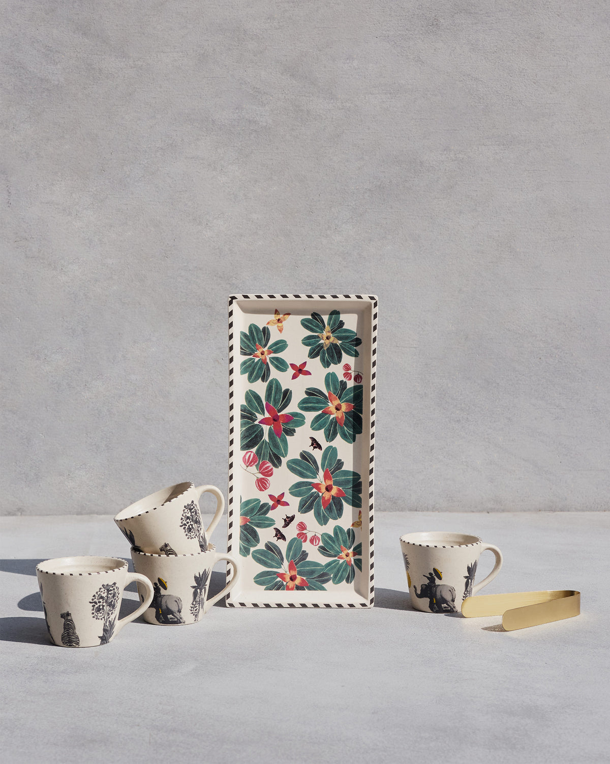 Tea and Coffee Set with floral tray, animal espresso mugs, and tongs.