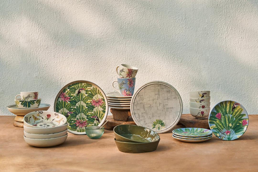 Madagascar tableware arranged on a wooden table.