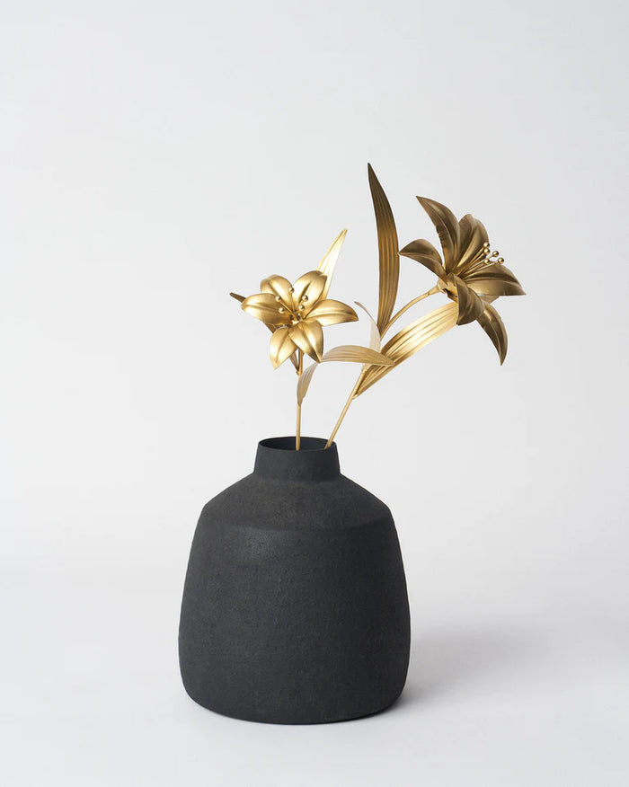 Pair of gold Lily Accent Pieces arranged in a dark vase.