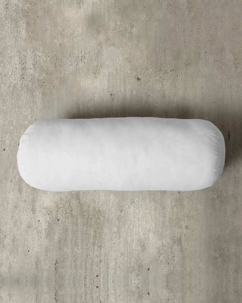 Overhead view of the white Bolster Filler on a concrete surface.