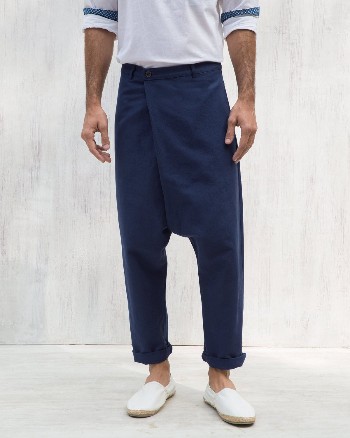 Blue Slouchy pants with a wrap front and drop-crotch fit.