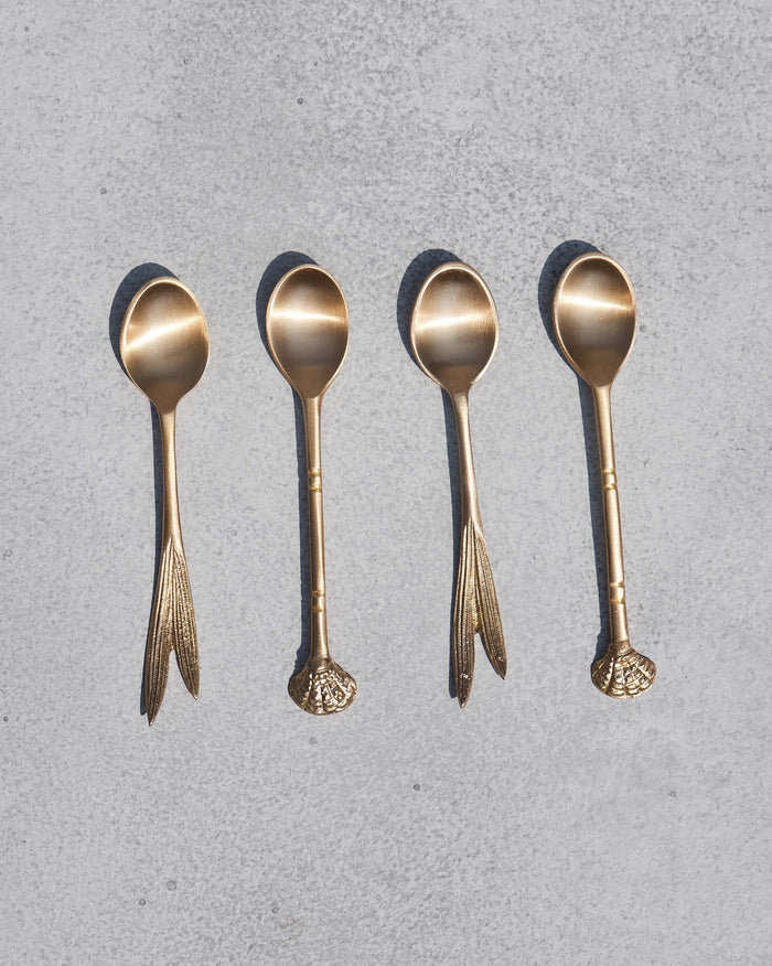Set of four Bahr coffee spoons, two with leaf handles and two with shell-shaped ends.