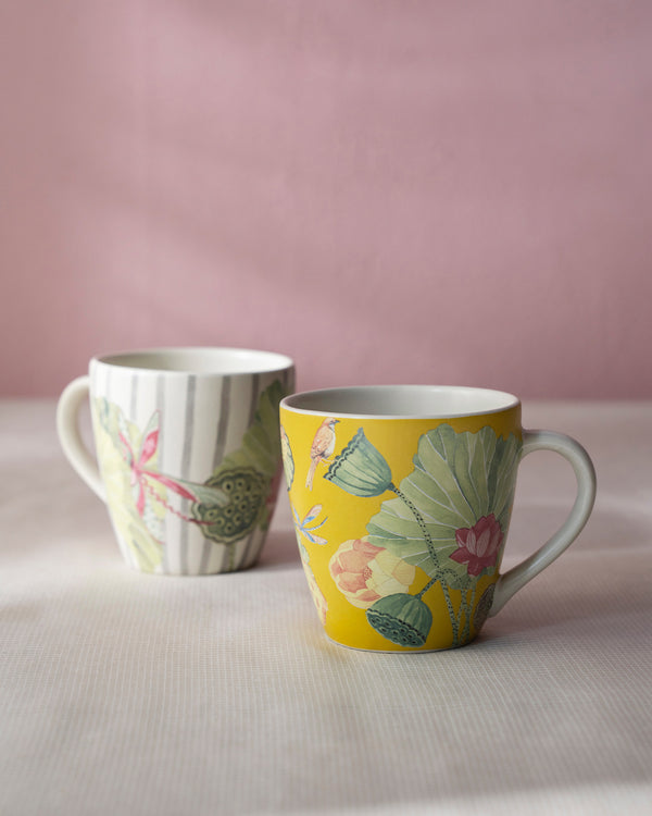 The striped mug and the yellow mug side by side