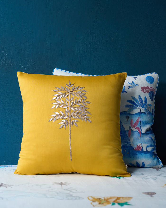 Yellow Golden Palm cushion cover with a metallic palm tree motif.