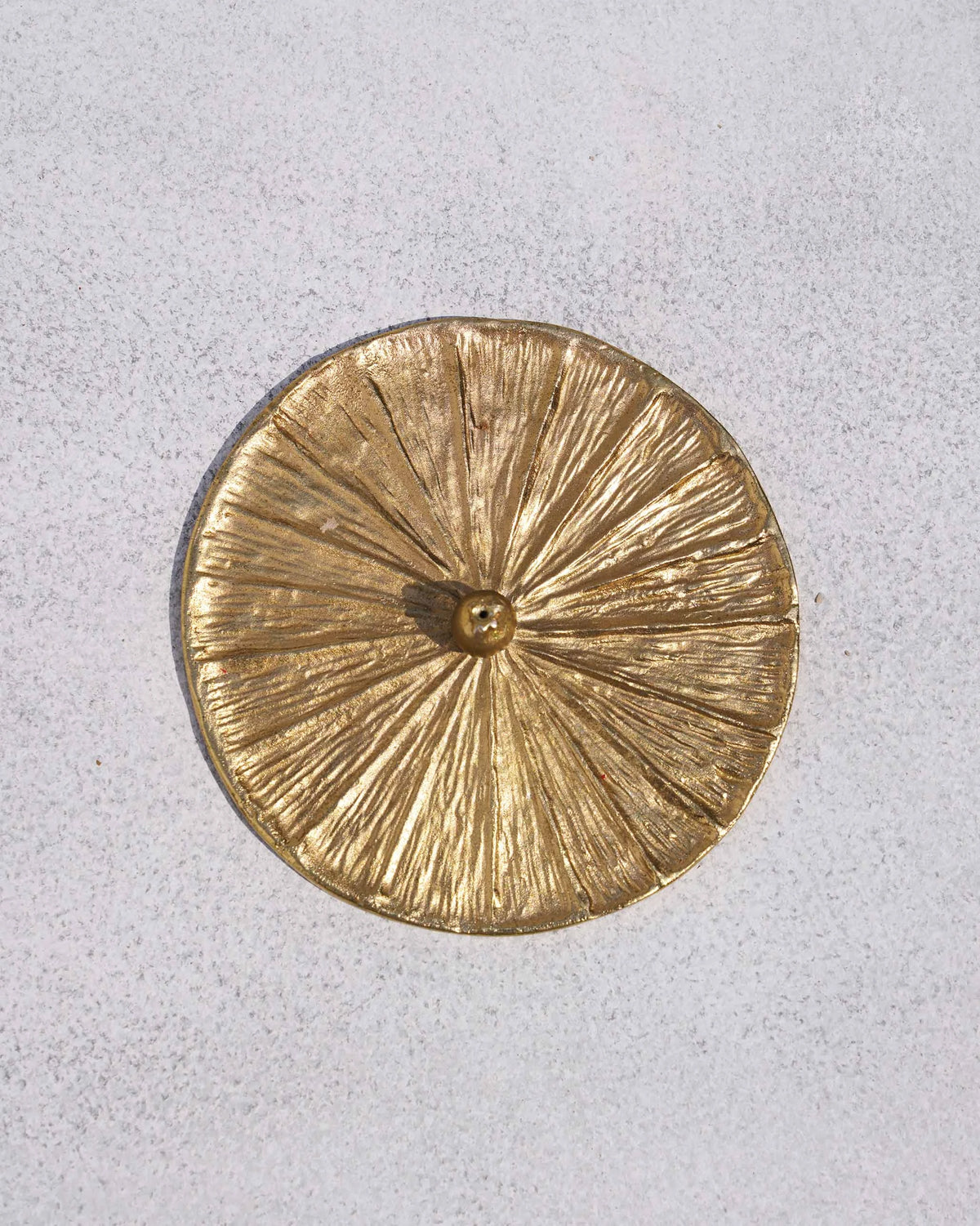 The sunburst holder from above.
